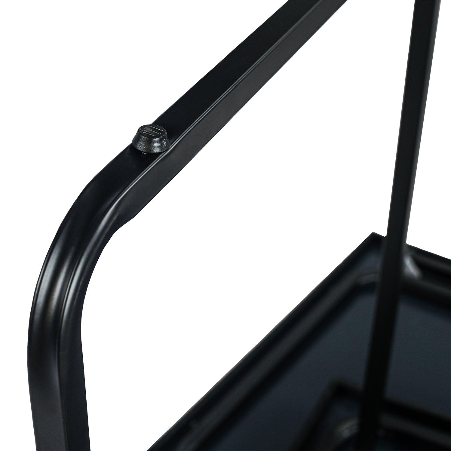 Schwarzer Metallrahmen mit Schraube und Teil eines Gestells.