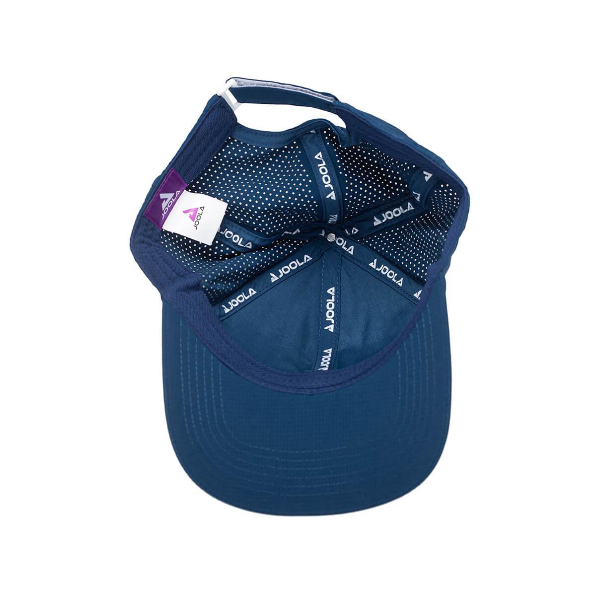 Fokus auf das einzigartige Design des JOOLA Kappe SCORPEUS von oben.